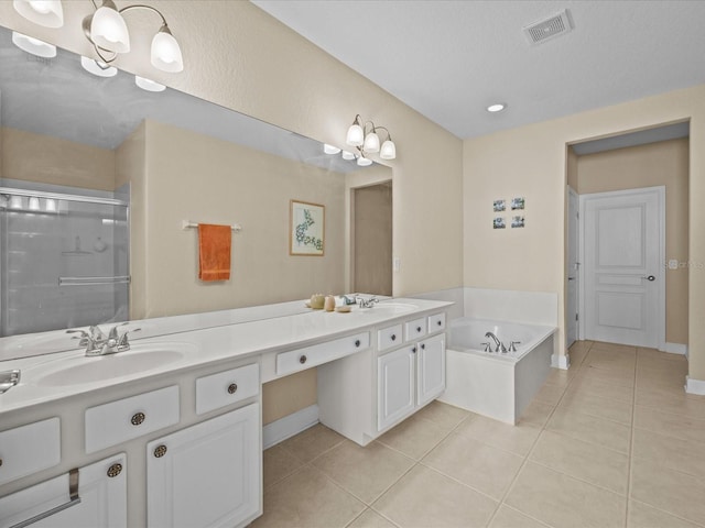 bathroom featuring tile patterned floors, vanity, and independent shower and bath