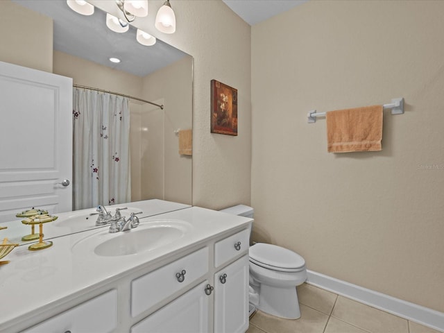 bathroom with tile patterned floors, vanity, curtained shower, and toilet