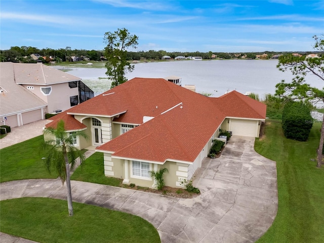 drone / aerial view featuring a water view