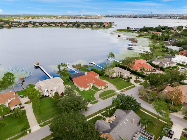 birds eye view of property featuring a water view