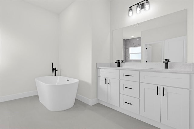 bathroom with separate shower and tub, tile patterned floors, and vanity