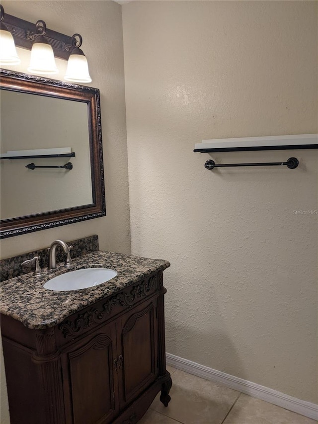 bathroom featuring tile patterned floors and vanity