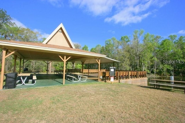 view of home's community with a lawn