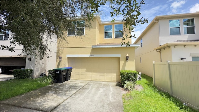 townhome / multi-family property featuring a garage