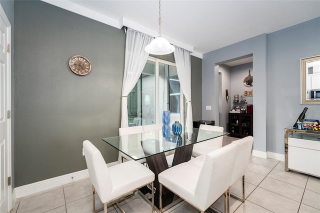 dining room featuring light tile patterned floors