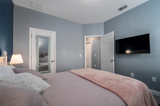 bedroom with a textured ceiling