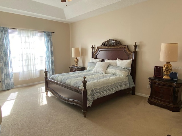 bedroom with light colored carpet and ceiling fan