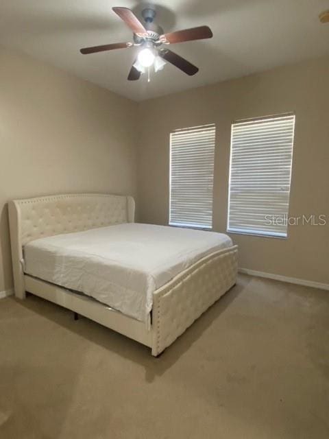 bedroom featuring carpet floors and ceiling fan