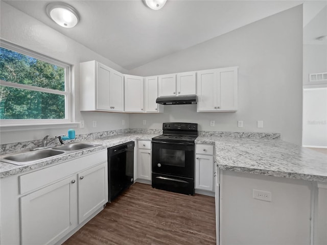 kitchen with white cabinetry, sink, kitchen peninsula, vaulted ceiling, and black appliances