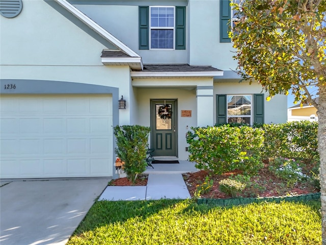 property entrance with a garage