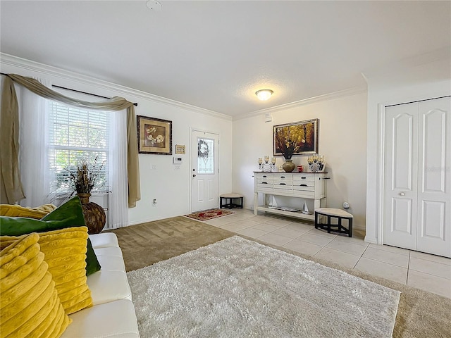 tiled foyer with crown molding