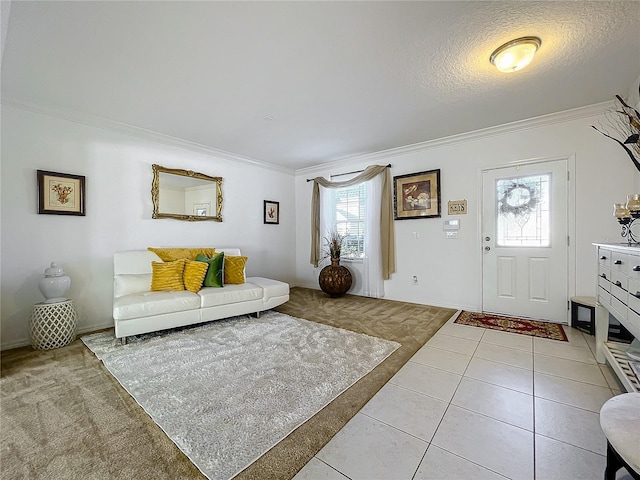 tiled living room featuring plenty of natural light, crown molding, and a textured ceiling