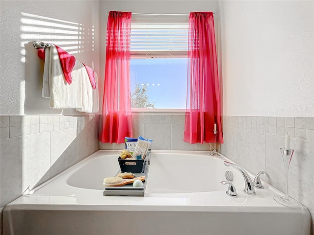 bathroom featuring a tub