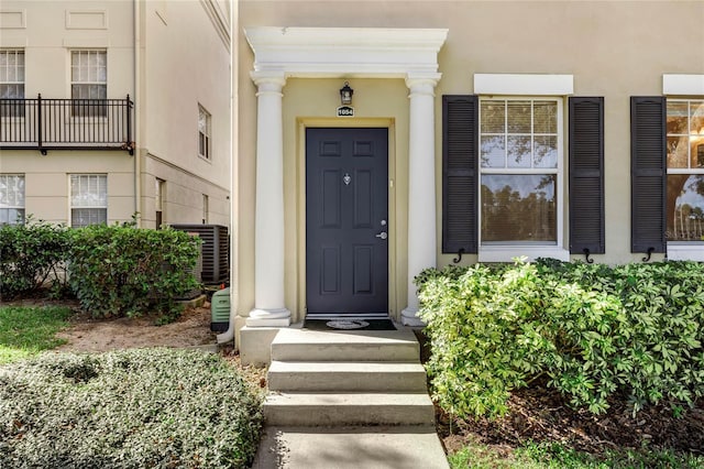 property entrance featuring cooling unit