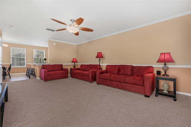 1054 Waterside Dr, Celebration, FL 34747 - carpeted living area featuring ceiling fan, baseboards, and ornamental molding
