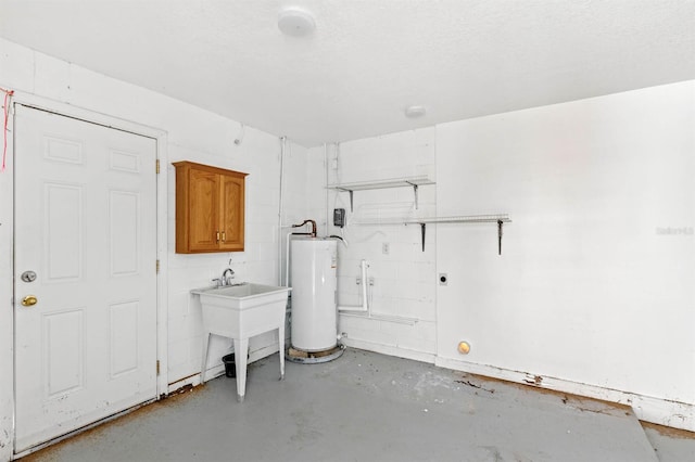 interior space featuring gas water heater and sink