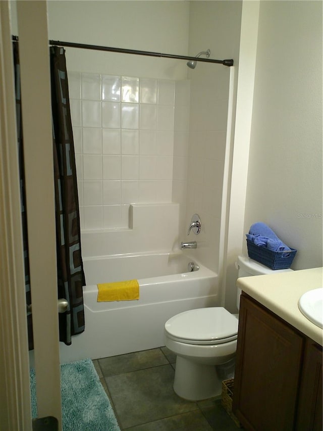 full bathroom featuring tile patterned flooring, vanity, shower / bath combination with curtain, and toilet