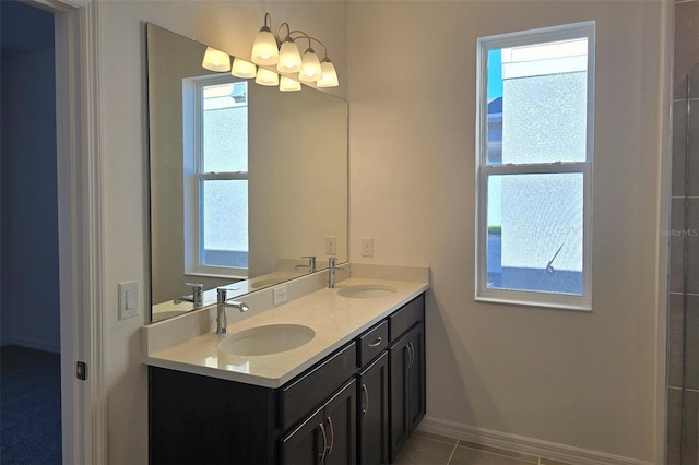 bathroom featuring tile patterned floors and vanity