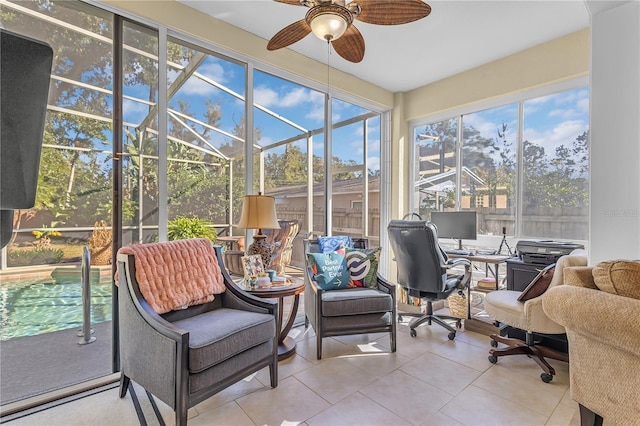 sunroom / solarium with ceiling fan