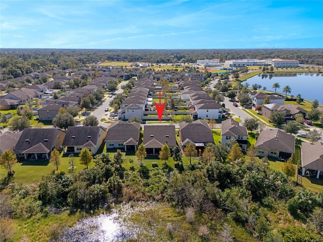 aerial view featuring a water view and a residential view