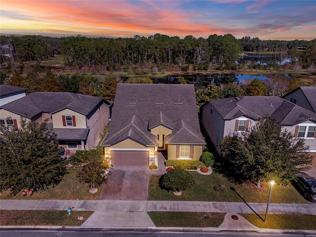 drone / aerial view featuring a water view