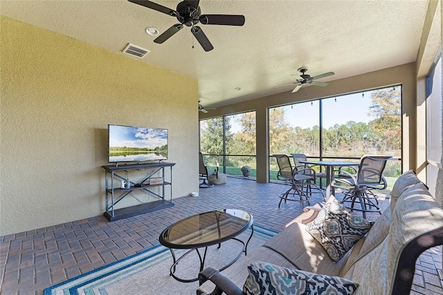 sunroom / solarium featuring visible vents