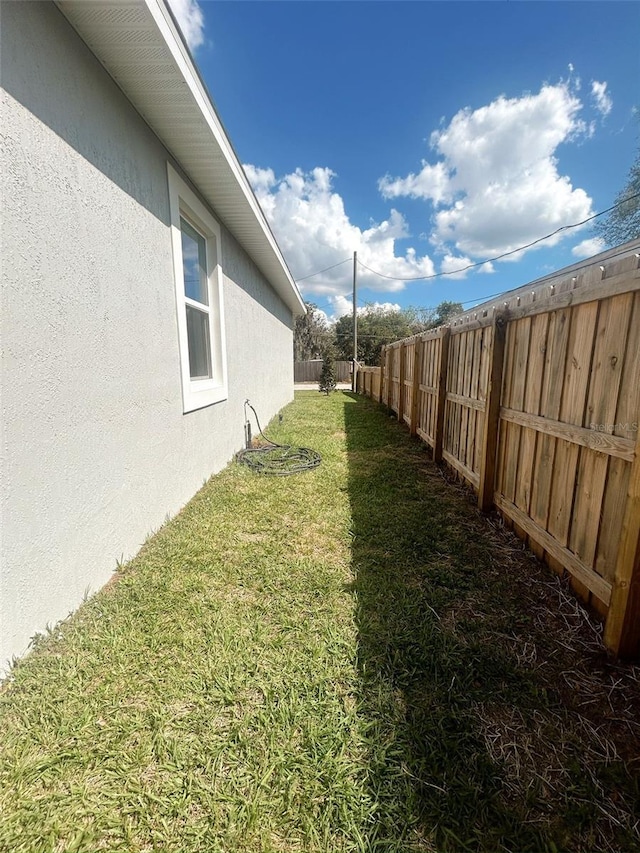 view of yard featuring a fenced backyard