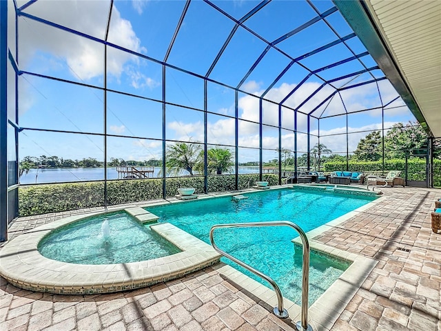 view of swimming pool featuring outdoor lounge area, a lanai, an in ground hot tub, a water view, and a patio