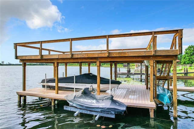 dock area featuring a water view