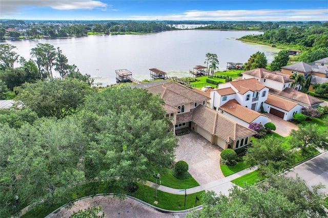 drone / aerial view with a water view