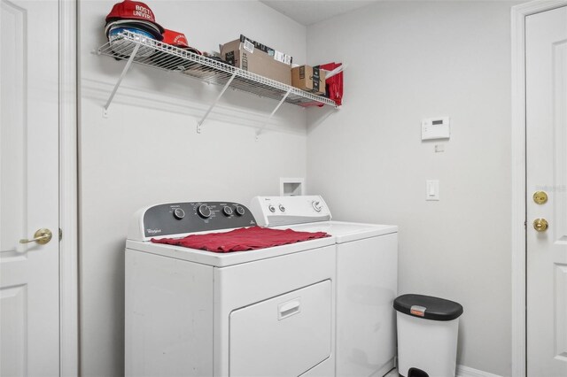 laundry room with washer and clothes dryer