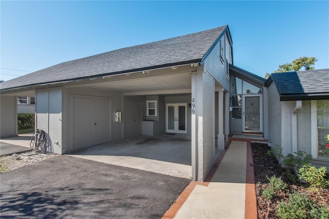 view of side of home featuring french doors