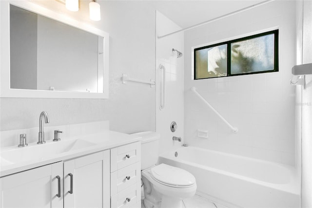 full bathroom featuring vanity, toilet, and tiled shower / bath combo