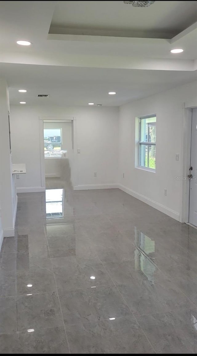 spare room with plenty of natural light