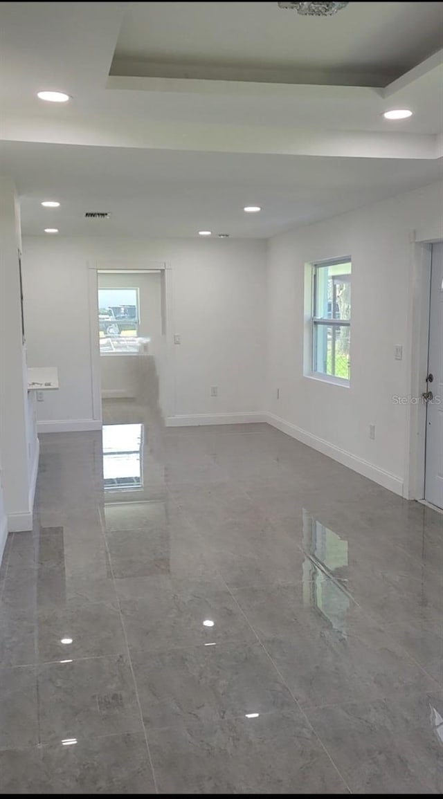 3458 NW 28th Ave, Okeechobee, FL 34972 - empty room featuring recessed lighting and marble finish flooring