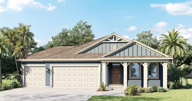 view of front of home with a garage and a front yard