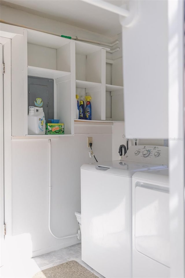 laundry room featuring separate washer and dryer