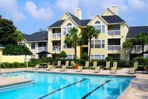 view of pool featuring a patio