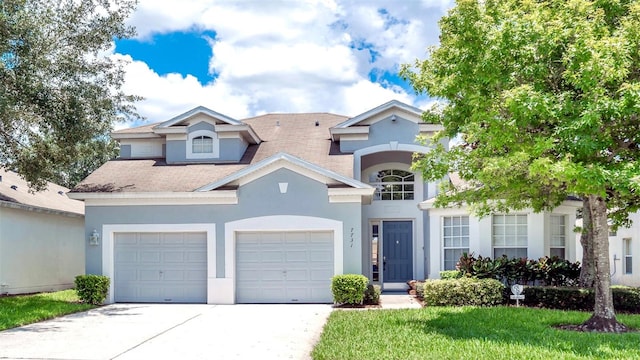 view of front of property with a garage