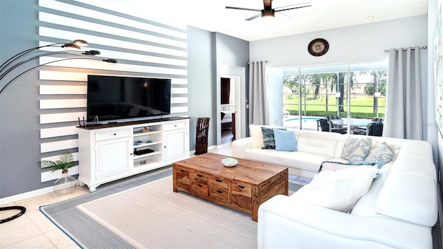 tiled living room with ceiling fan