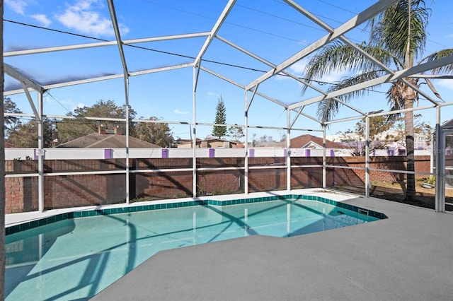 view of pool featuring a lanai