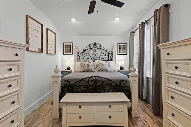 bedroom featuring light wood-type flooring and ceiling fan