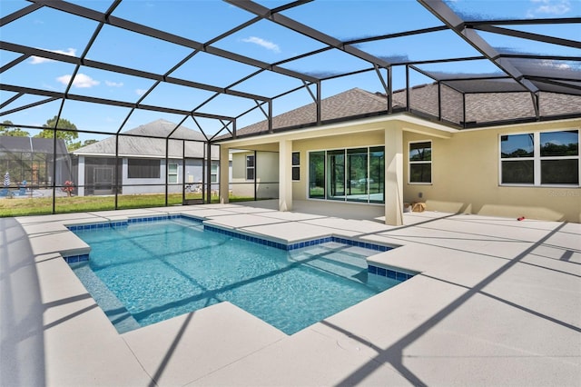 pool featuring a lanai and a patio