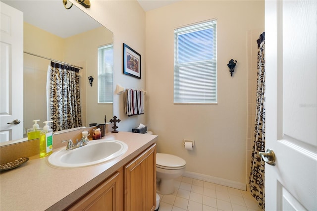 bathroom with tile patterned flooring, vanity, toilet, and a shower with curtain