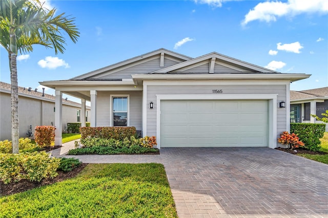 view of front of home with a garage