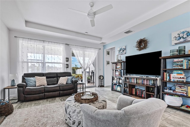 living room featuring ceiling fan