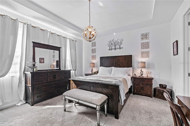 bedroom featuring light carpet and a notable chandelier