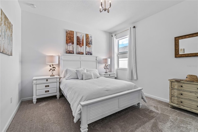 bedroom with dark colored carpet