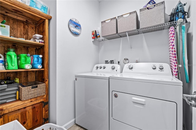 clothes washing area featuring washing machine and dryer