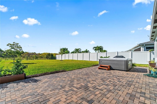 view of patio / terrace featuring a hot tub